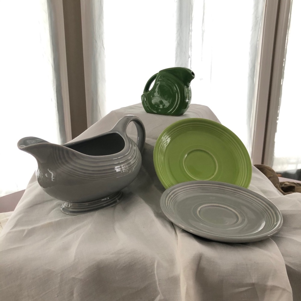 Fiesta small disc pitcher, gravy boat, two saucers